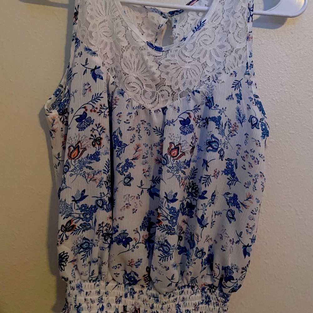 White sleeveless floral top